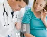 doctor-examines-pregnant-woman.jpg